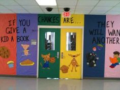 colorful classroom doors decorated with children's pictures and words that say, if you give a kid a book