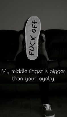 a woman sitting on top of a couch with her feet up and the words, my middle finger is bigger than your lolly