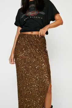 Party time. Feel like the centre of attention in our maxi skirt, made in sparkling sequin fabric, with a flirty leg split and a flared silhouette Style it with a crop top and strappy heels for a look that will take you from party nights to nearby dancefloors and upcoming occasions. Sequin Split Maxi Skirt Sparkling Sequin Fabric Stellar Straight Silhouette Flattering High Waistline Flirty Knee High Leg Split Model wears a size M (US size 6/UK size 10). Split Maxi Skirt, Leg Split, Oasis Fashion, Sequin Fabric, High Leg, Fashion Face, Strappy Heels, Party Time, Knee High