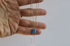 This dainty necklace is just perfect for the summer and is also the birthstone of anyone born in the month of December. D E T A I L S  *Made with a beautiful genuine turquoise tear drop measuring between  7x10-9x13  *This has been wire wrapped  with gold filled/sterling silver and hangs from at a non tarnish 14k stainless steel chain. Choose between 14k gold, rose gold or silver. *It closes with a stainless steel lobster clasp. *Necklace comes with a matching crystal information card and is read Dainty Turquoise Pendant Necklace, Turquoise Teardrop Drop Necklace Gift, Turquoise Teardrop Necklace For Gift, Dainty Turquoise Teardrop Jewelry, Crystal Information, Gold Filled Necklace, Information Card, Clasp Necklace, Necklace Turquoise