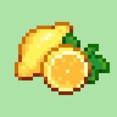 an orange pixelated in yellow and green with leaves on it's back side