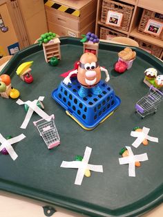 a play tray with toys on top of it