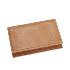 a tan leather business card case on a white background