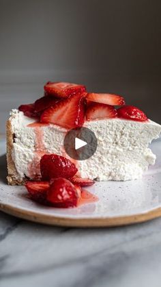 a piece of cheesecake with strawberries on top