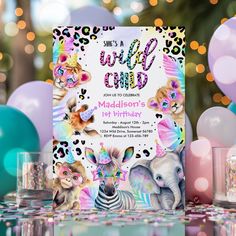 an animal themed birthday party with balloons and confetti