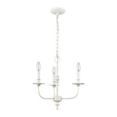 a white chandelier with three lights hanging from it's sides and two candles in the middle