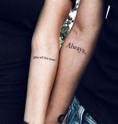 two people with arm tattoos that say always, and they are both holding each other's hands