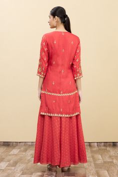 Red kurta highlighted with intricate floral embroidery, round neckline and straight fit. Comes with gharara and dupatta. 
Component: 3
Embroidered
Neckline: Round
Sleeve Length: Three Quarter
Color: Red
Straight kurta
Notched round neckline
Embroidered dupatta - Aza Fashions Red Kurta, Kurta Set For Women, Embroidered Dupatta, Red Embroidery, Straight Kurta, Embroidered Neckline, Fashion App, Kurta Set, Set For Women