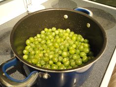 peas are being cooked in a pan on the stove