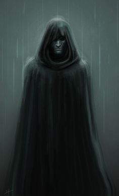 a man in a black cloak standing in the rain