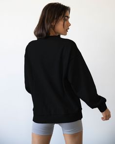 Our daily wear french terry sweatshirt is slightly oversized and pairs perfectly with any outfit. Features minimal and tonal Rebody embroidery. Made in our heavier weight French Terry fabric that gives more structure and is pre shrunken cotton. Machine Wash Model is 5'7" wearing size S Athleisure Everyday Sweater, Everyday Athleisure Sweater, Oversized Black Fleece Sweatshirt, Sporty French Terry Sweatshirt For Layering, Basic Long Sleeve Sweatshirt With Ribbed Waistband, Sporty Fleece Sweatshirt, Sporty Fleece Sweatshirt For Everyday, Sporty French Terry Sweatshirt For Everyday, Oversized Fleece Sweatshirt Basic Style