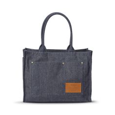 Meet the Runabout Open Tote—our unisex, everyday travel companion that’s just as functional as it is good-looking. | Shinola Runabout Open Tote Bag in Denim Denim Blue Shoulder Bag With Pockets For On-the-go, Denim Blue Canvas Shoulder Bag For Everyday Use, Denim Rectangular Satchel For Everyday Use, Denim Canvas Bag With Pockets For Everyday, Denim Blue Tote Shoulder Bag For Everyday Use, Everyday Denim Blue Canvas Shoulder Bag, Everyday Denim Rectangular Satchel, Denim Blue Canvas Bag With Pockets For Everyday Use, Denim Blue Canvas Bag For Everyday Use