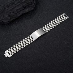 Let me introduce you to our men's bracelets! Known for its premium quality and beautiful and sturdy appearance, this bracelet provides you with a unique way to express your love and adoration for your boys, dads and male friends. Whether as a fashion accessory or a personalized gift, our men's bracelets are perfect. This bracelet is made from the highest quality materials and exquisite craftsmanship, ensuring high quality and durability of the product. Each link is carefully polished and treated to reveal exquisite detail and solid construction. Our men's bracelets are a great gift option for boyfriends, dads and male friends. Whether it's a birthday, anniversary, Father's Day, or another special occasion, this bracelet will express your love and appreciation for them. Let them feel your c Personalized Silver Stainless Steel Wristband, Classic Stainless Steel Wristband Bracelet, Silver Stainless Steel Wristband With Jubilee Bracelet, Father's Day Jubilee Bracelet Jewelry, Father's Day Jubilee Bracelet, Stainless Steel Bracelet For Father's Day, Father's Day Engraved Stainless Steel Bracelets, Father's Day Stainless Steel Engraved Bracelets, Father's Day Stainless Steel Bracelet