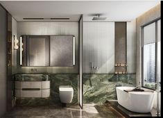 a modern bathroom with marble walls and flooring