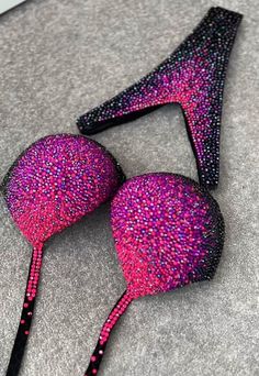 This bikini dazzles with a combination of sparkling black, deep purple, and neon pink rhinestones, creating a vibrant and eye-catching ensemble. The bold and vivid colors of the rhinestones contrast beautifully with the rich black fabric, making it a striking swimwear choice. Production time excluding delivery: finished design - 4-5 weeks; custom design 2-3 months. ----------------------------------------------------- We invite you to see other offers of our store. Pink Shining Crystals Fitness Bride Basket, Brides Basket, Figure Competition, Womens Sports, Pink Rhinestones, Model Poses, Slovenia, Deep Purple, Neon Pink