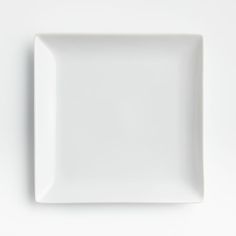 a square white plate on a white surface