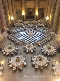 an overhead view of a banquet hall with tables and chairs set up in the center