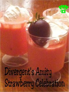 two glasses filled with drinks sitting on top of a table