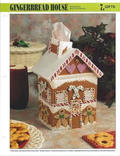 a gingerbread house is featured in the paper crafting book, gingerbread house