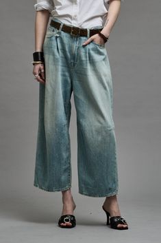 Cropped wide leg jean featuring a pleated waist, knee darts and tapering for a fuller silhouette. Built with mid weight Italian indigo denim with a soft, light vintage wash. MADE IN ITALY Color: Toni Blue Mads is 5'9" and wearing size 27 Bust 32"; Waist 24"; Hips 32" 100% Cotton R13WD046-D045B Cropped Wide Leg Jeans, Indigo Denim, Skirt Jumpsuit, Short Jacket, Soft Light, Coat Dress, Sweater Shirt, Wide Leg, Casual Outfits