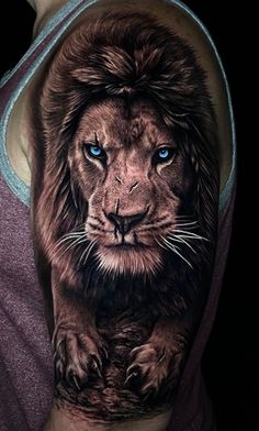 a man's arm with a lion tattoo on it, and the face of a lion