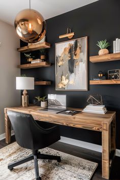 a home office with black walls and wooden shelving on the wall, along with a desk