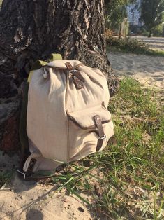 "READY TO SHIP GREAT vintage soviet backpack from 1990s. Made in USSR. Color: Khaki with brown. Residents of the Soviet Union loved tourism and very often went camping on long hikes. A good and reliable backpack is necessary for every tourist. This backpack also participated in many campaigns and nevertheless it retained its qualities and aesthetic appeal. Material: High Quality Canvas, Leather straps. Measures about : Width - 16,5\",42 cm approximately Height - 17,5\",, 44 cm approximately Vint Vintage Travel Backpack With Adjustable Strap, Vintage Satchel School Backpack, Everyday Vintage Satchel Backpack, Vintage Leather Backpack For Adventure, Vintage Leather Adventure Backpack, Vintage Backpack With Adjustable Strap For Adventure, Vintage Leather Backpack For School, Retro Brown Backpack For School, Beige Satchel Backpack For Outdoor