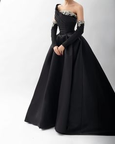 Experience elegance and glamour in our Dreamy Vow one shoulder evening dress. Made with luxurious black satin and embellished with sparkling crystals, this dress exudes sophistication and style. Perfect for any special occasion, it will make you stand out and feel confident. window.adminAccountId=244214477; Saudi Dress, Wedding Dress Overskirt, Vestido Charro, Scarf Display, Beaded Evening Gowns, Pink Evening Dress, Charlie Video, White Evening Dress, Red Evening Dress