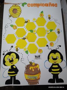 a bee themed bulletin board with bees and honeycombs on the front, in spanish