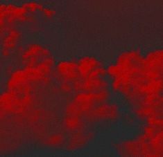 red clouds in the sky at night time