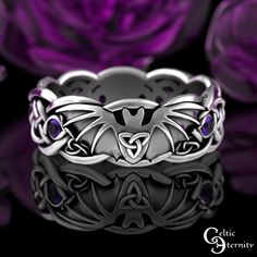 "See other stone options: https://www.etsy.com/shop/CelticEternity?search_query=3138 Band Height: 6.7mm Stones: 8x 2mm Amethyst This ring features a flying bat with wings spread and traditional knotwork. Bats are mysterious creatures of the night and have a lot of different symbolism attached to them. Bats can symbolize cycles and rebirth, communication, intuition, and happiness. Because Bats come out at night, folk wisdom calls these creatures \"Night's Guardian\". Every ring is handmade to order and in YOUR CUSTOM size; we do not keep backstock. Please buy our refundable ring sizer (BEFORE ORDERING) as most rings cannot be resized because of the continuous knotwork: www.etsy.com/listing/937178260 About This Item: Cast in solid 925 sterling silver (nickel-free), these rings are made of 10 Bat Ring, Purple Goth, Mysterious Creatures, Goth Ring, Flying Bat, Halloween Ring, Celtic Ring, Bat Halloween, Ring Purple