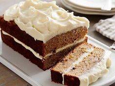 a slice of carrot cake with cream cheese frosting