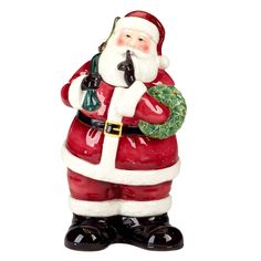 a santa clause figurine holding a christmas wreath and bell in his hand, on a white background