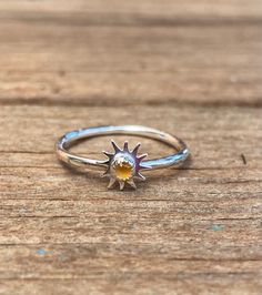 This is a sterling silver sun ring. The sun and bezel setting have been soldered to the wire. All components of the ring are sterling silver.  The sun measures 8mm with a 3mm citrine cabochon in the bezel. This ring works best with other stacking rings since the spikes of the sun are a bit sharp and wearing them with the other stacking rings don't allow the spikes to protrude as much. The wire band is made with 1.5mm wire.  The citrine stone is translucent and shines bright yellow in the light o Evil Eye Ring Silver, Sun Ring, Mushroom Ring, Hematite Ring, Stackable Rings Silver, Sun Stone, Evil Eye Ring, Gothic Rings, Citrine Stone