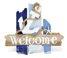 a wooden sign that says welcome with an anchor and starfish