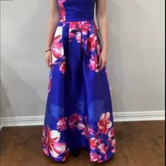 Formal Satin Dress. Royal Blue With Pink Flowers. Size 3 Blue Floral Print Prom Season Dress, Blue Floral Print Dress For Prom Season, Blue Floral Print Prom Dress, Floor-length Blue Dresses For Spring, Royal Blue Wedding Dress For Spring, Blue Prom Dress For Spring Season, Blue Prom Dress For Spring, Blue Spring Prom Dress, Formal Satin Dress