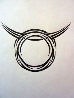 a black and white drawing of a bull's horns on a sheet of paper