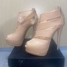 Giuseppe Zanotti Tan Platform Bottie Heels. Size 7.5, Zipper Closure In Back. Worn Multiple Time But In Good Condition. Beige Patent Leather Heels For Party, Modern Beige Heels For Party, Beige Open Toe Heels For Cocktail, Evening Beige Heels With Branded Insole, Designer Beige Closed Toe Heels, Designer Almond Toe Platform Heels, Designer Heels With Wrapped Heel And Round Toe, Zanotti Shoes, Giuseppe Zanotti Shoes