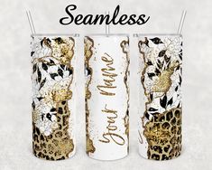 two white and gold decorated candles with the words seamless on them, next to each other