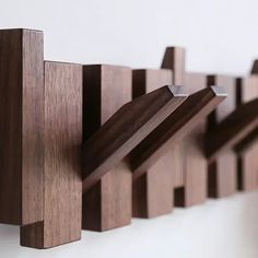 a close up of a wooden object on a wall