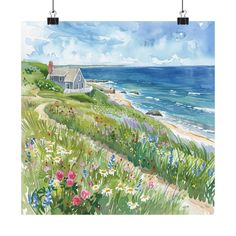 a watercolor painting of a house on the coast with wildflowers and daisies