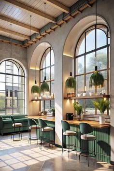 the interior of a restaurant with large arched windows and green chairs, potted plants on the counter