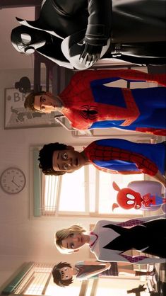 the spider - man and woman are standing next to each other in front of a clock