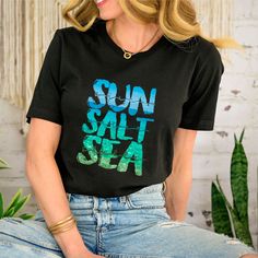 Sun Salt Sea Beach Shirt, Beach Shirt, Summer Shirt, Summer Vibes, Beach Party Shirt, Beach Vibes, Family Beach Shirt, Shirt for the Beach --How To Order-- 1-) Please, Check and Review all Photos. 2-) Choose Your T-Shirt Size and Model From the "Size" Menu. 3-) Choose Your T-Shirt Color from "Primary Color" Menu. 4-)Choose the quantity as much as you want. 5-) Click ADD TO CART. You can go back to add more product color for your family members anytime you want, or you can complete the checkout process. 6-) Please click the "Proceed to Check Out" button 7-) Finally, Processing time is 1-3 days. Shipping time is based on the shipping type you'll select at checkout. -When you check out, you can add a note to seller for any request. -The shirts are very high quality and super soft comfortable Black Printed T-shirt For Vacation, Trendy Relaxed Fit Camp Shirt For The Beach, Black Hawaiian Shirt For Vacation, Black Summer Beach Shirt, Black Summer Shirt For Vacation, Black Summer Shirt For The Beach, Black Summer Shirt For Beach, Beachy Camp Shirt For Summer Vacation, Trendy Blue Shirt For Beach