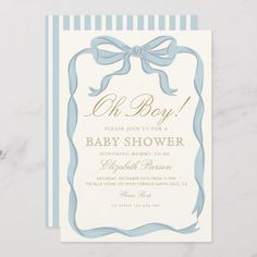 a baby shower card with a bow on it