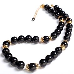 "Black Onyx 12mm Round Beads with Freshwater Pearl Spacer Beads and 18K Gold Plated 20\" Necklace and 2\" Extension" Onyx Beaded Necklaces With Polished Round Beads, Onyx Beaded Necklaces With Large Round Beads, Gold Pearl Necklace With Black Round Beads, Onyx Beaded Round Necklaces, Black Onyx Round Beaded Necklaces, Black Onyx Round Beads Necklace, Black Onyx Round Beads Crystal Necklace, Gold Rosary, Black Beaded Jewelry