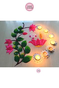 decorative diya with flowers and candles on the table for diwaling or decorating