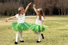 "The \"Fiona\" unicorn shamrock tutu set is made with layers of green, lime green and hunter green tulle. This set includes options for a matching flower headband and a white unicorn shirt or bodysuit in green glitter. Our tutus are made on a ribbon-tie waistband that ties and unties at the bow for a custom fit. Rainbow clip not included. Headband will match the colors in the outfit as shown in photo 2. Bodysuit size-------------------------Tutu/Outfit Size Newborn (5-9 pounds)------------NB tut Green Spring Tutu Dress For Birthday, Spring Green Tutu Dress For Birthday, Green Spring Birthday Tutu Dress, Cute Fitted Green Tutu Dress, Tutu Size Chart, Unicorn Outfit, Green Tulle, White Unicorn, Unicorn Shirt