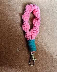 a pink and blue rope is on the floor