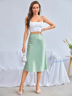 Green Satin Skirt, Women's Fashion, Bottoms, Skirts on Carousell